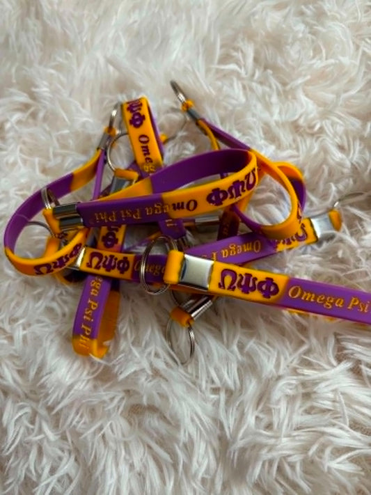 Omega Psi Phi Rubber Wristlet Keychain – Premium Purple & Gold Fraternity Key Ring