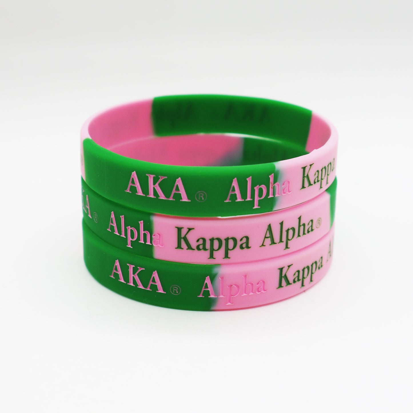 Pink and green wristband each